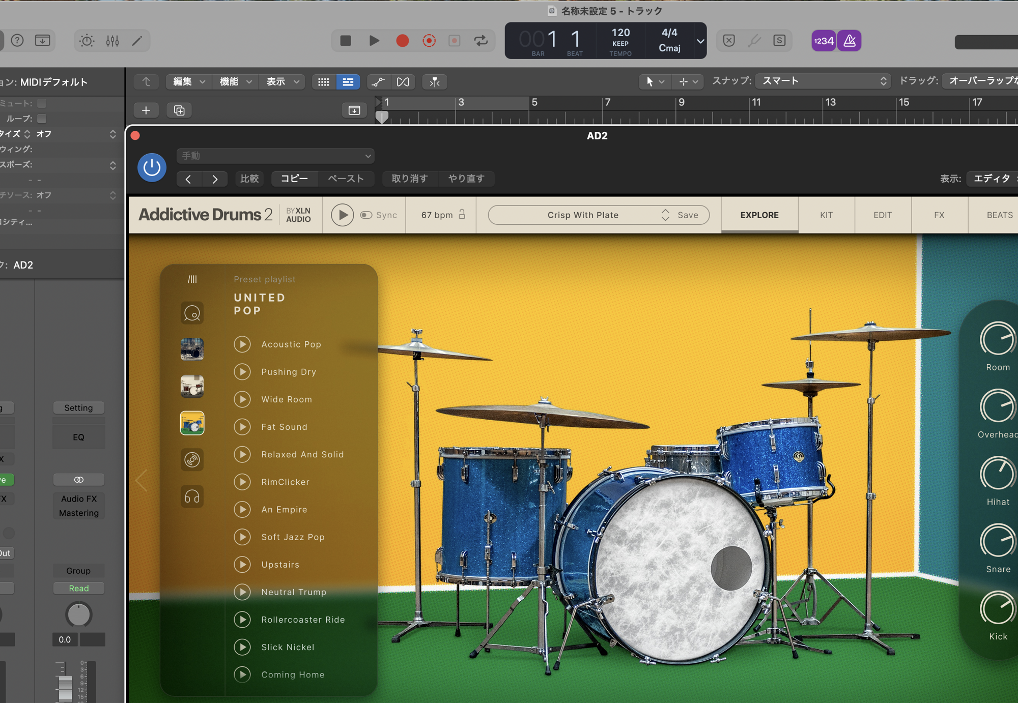 Addictive Drums 2 の EXPLORE 画面。プリセットキットのプレビューと、右側に Room・Overhead・Hihat・Snare・Kick のクイックミックスノブが並ぶ