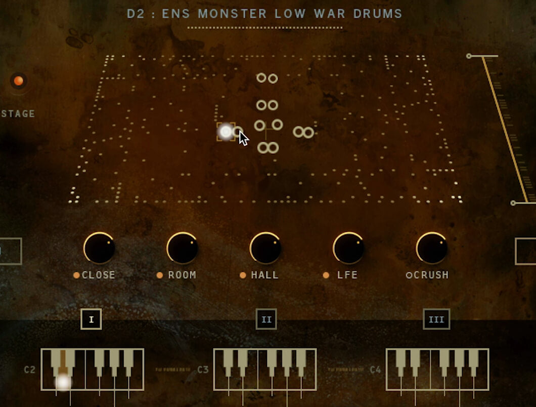 Damage 2のEnsemble Designerの画面。ENS MONSTER LOW WAR DRUMSを読み込み、ステージ上で太鼓の位置を動かせ、下にCLOSE・ROOM・HALL・LFE・CRUSHの5つのマイクのつまみが並ぶ（Heavyocity公式の画像）