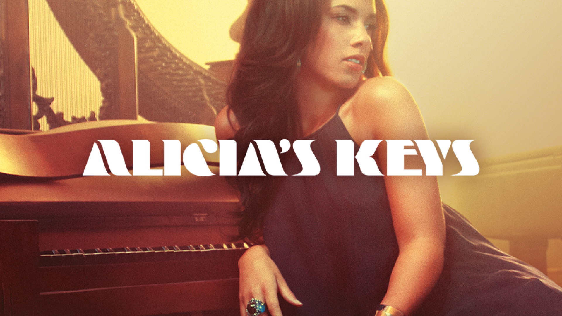 Native Instruments公式のAlicia's Keysの製品画像。Alicia Keysさんとグランドピアノ